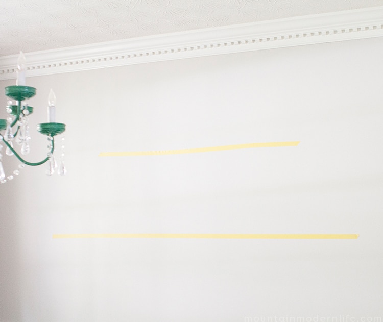 Looking to create shelves with little to no tools? See how you can easily create these Rustic Modern Shelves using pipes! MountainModernLife.com