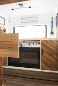 Whether you live in a small space, or are looking for space saving ideas, you've gotta check out this DIY pull out table that was built inside a RV! MountainModernLife.com