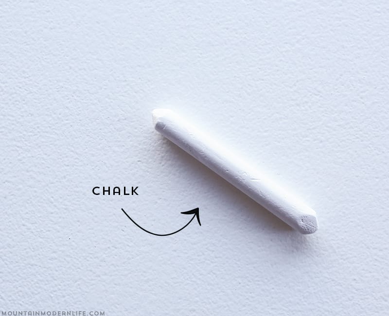 See how easy it is to create this mountain wall art using reclaimed wood. | MountainModernLife.com