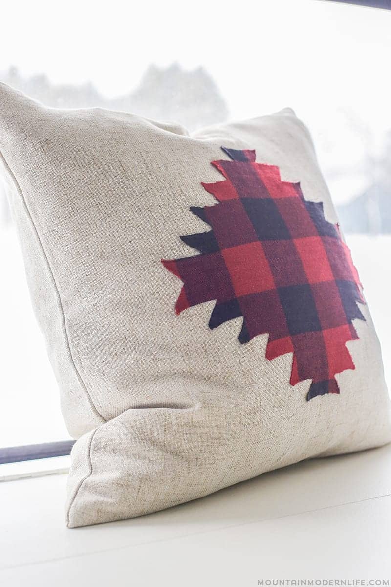 Love Buffalo Plaid? See how easy it is to make these No-Sew Rustic Winter Pillows that you can keep around after the holidays! MountainModernLife.com