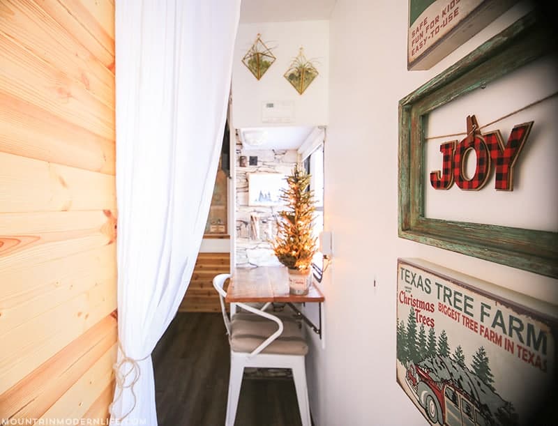 RV Christmas Home Tour - Come see how we decorated our tiny home on wheels for the holidays! MountainModernLife.com