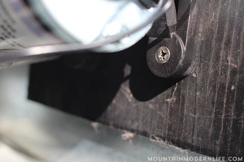 screw holding rv water pump in place mountainmodernlife.com