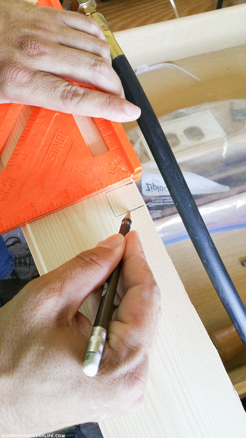 Easily install a wood planked kitchen backsplash in a RV! This is the perfect way to add rustic modern or farmhouse style to your tiny home on wheels!