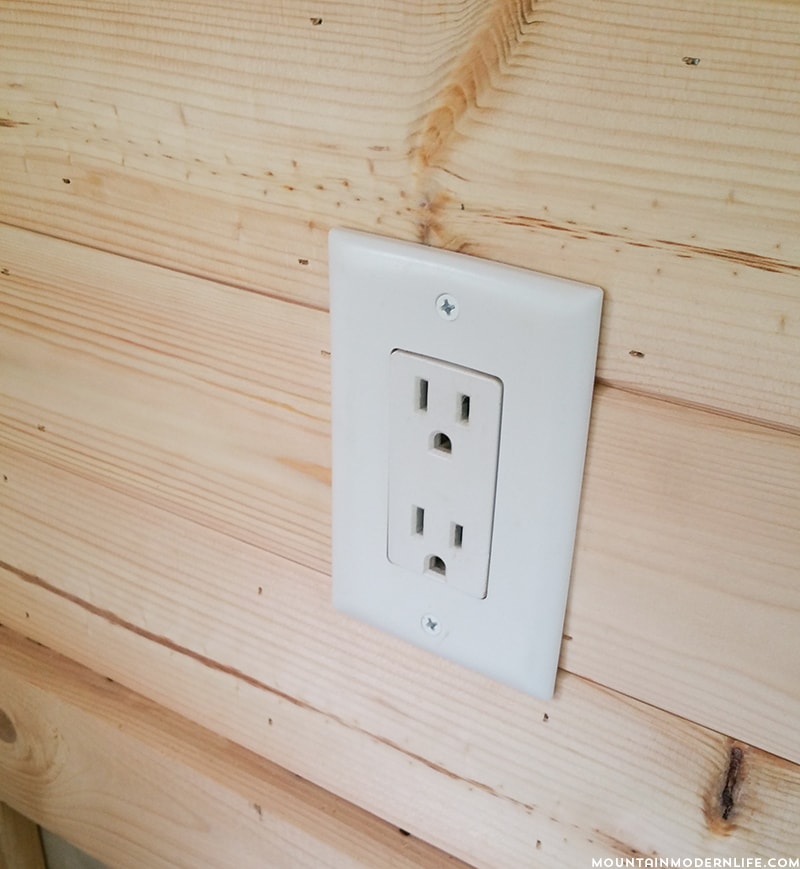 Easily install a wood planked kitchen backsplash in a RV! This is the perfect way to add rustic modern or farmhouse style to your tiny home on wheels!