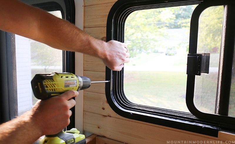 Easily install a wood planked kitchen backsplash in a RV! This is the perfect way to add rustic modern or farmhouse style to your tiny home on wheels!
