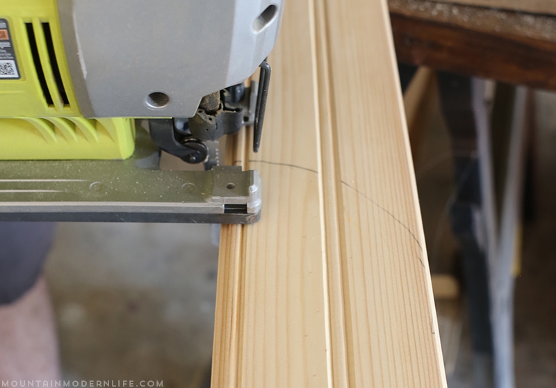 Easily install a wood planked kitchen backsplash in a RV! This is the perfect way to add rustic modern or farmhouse style to your tiny home on wheels!