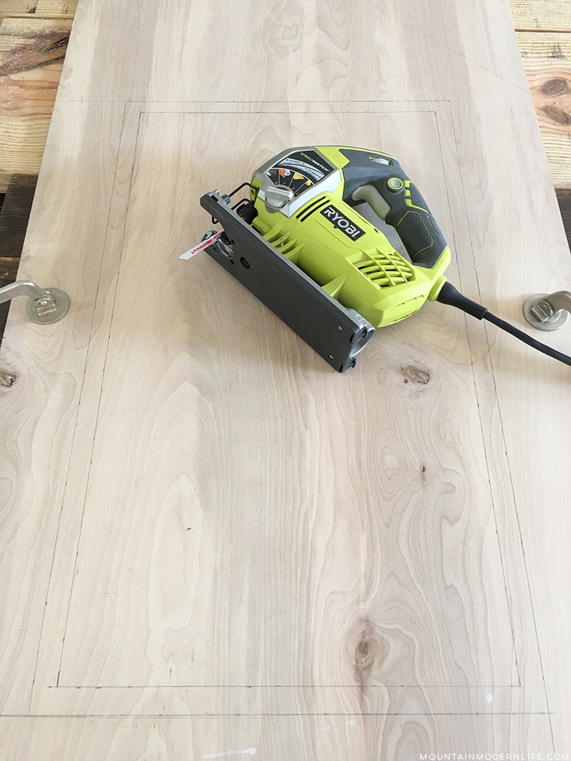 using-jigsaw-to-cut-hole-for-sink-in-counter-template-mountainmodernlife.com Looking for an affordable way to update your kitchen counters? Check out this post on how to Create Wood Counters from Flooring (in a RV)! MountainModernLife.com