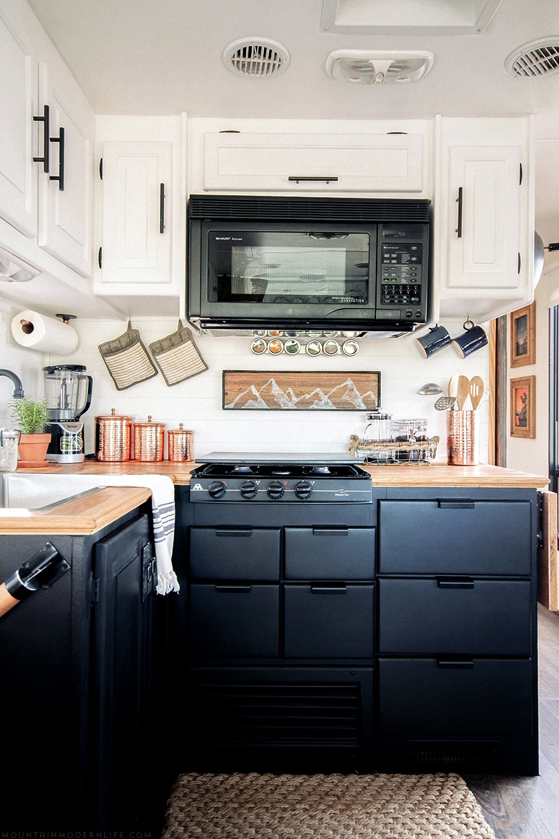 modern-rustic-tiny-kitchen-renovation-mountainmodernlife.com Could you live in less than 300 square feet? See how this outdated motorhome was completely transformed into a rustic modern RV! MountainModernLife.com