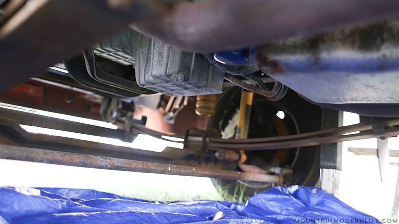 oil-drain-plug-changing-the-oil-in-our-gas-rv-mountainmodernlife.com Removing RV drain plug