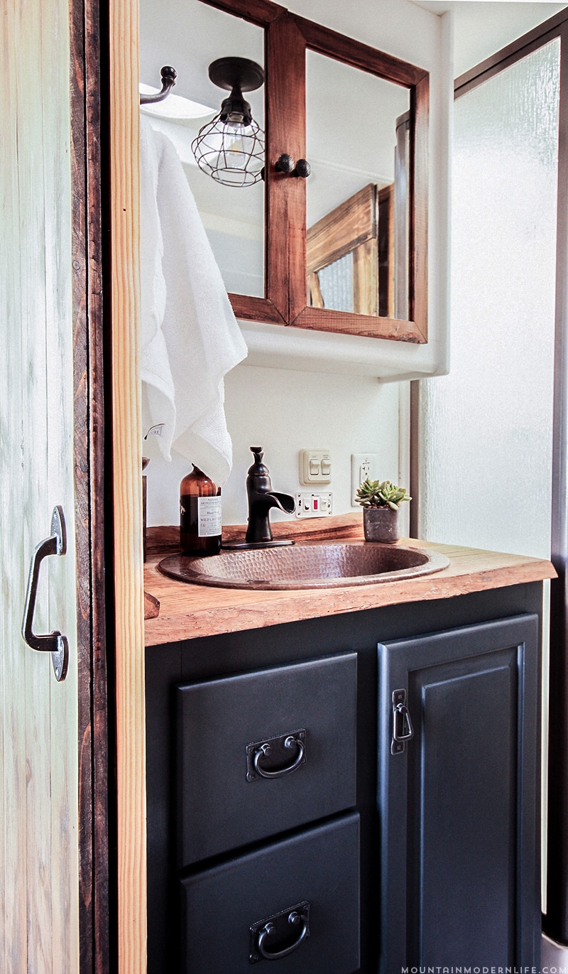 Could you live in less than 300 square feet? See how this outdated motorhome was completely transformed into a rustic modern RV! MountainModernLife.com