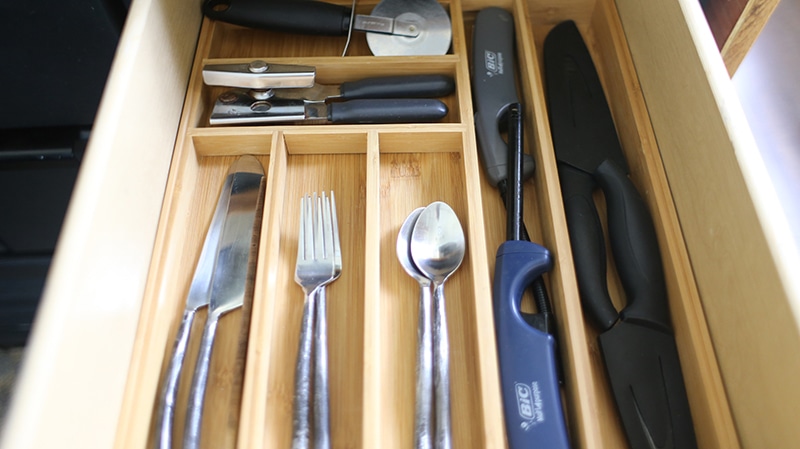 Looking for ways to maximize the space in your RV? Here are some tips for Organizing a Tiny Kitchen! MountainModernLife.com