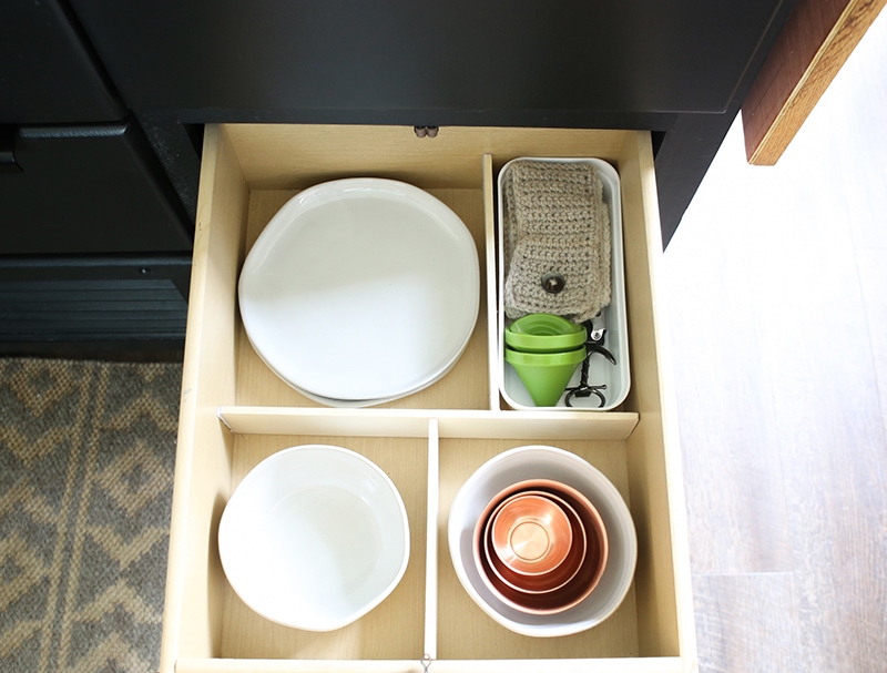 Looking for ways to maximize the space in your RV? Here are some tips for Organizing a Tiny Kitchen! MountainModernLife.com