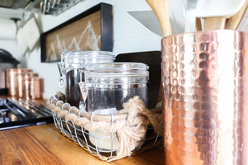 Looking for ways to maximize the space in your RV? Here are some tips for Organizing a Tiny Kitchen! MountainModernLife.com