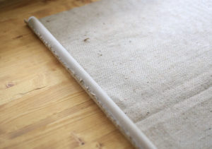 Looking for ways to add warmth and texture to your home or RV? See how easy it is to make burlap roller shades! MountainModernLife.com
