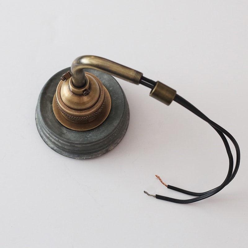 See how easy it is to make a Mason Jar wall light fixture with a dimmer switch, perfect for adding a rustic touch to your home or RV! MountainModernLife.com