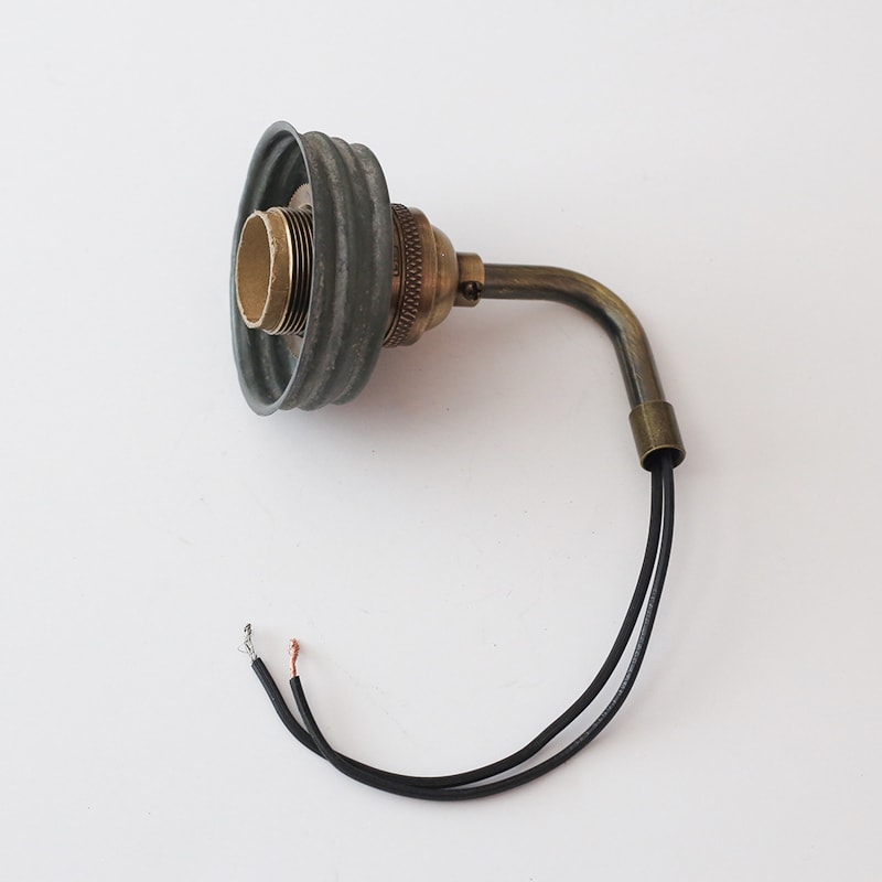 See how easy it is to make a Mason Jar wall light fixture with a dimmer switch, perfect for adding a rustic touch to your home or RV! MountainModernLife.com