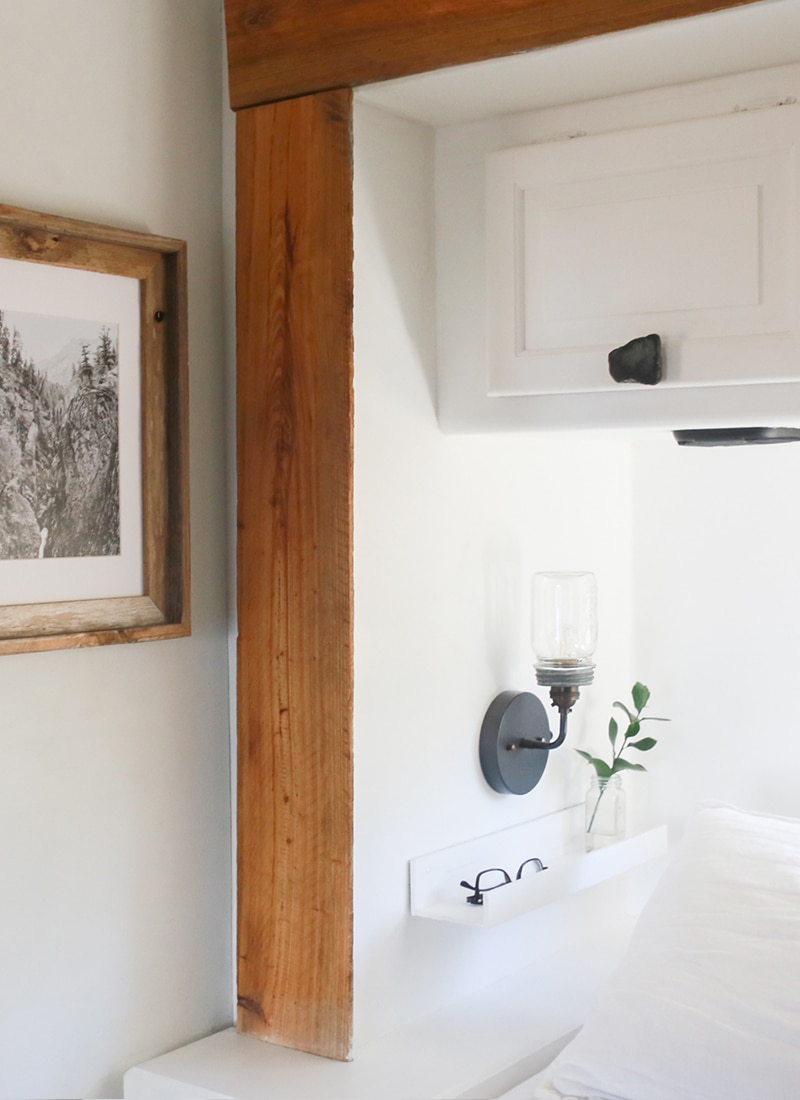 DIY Mason Jar Light Fixture - See how easy it is to create this wall sconce with a dimmer switch, perfect for adding a rustic touch to your home or RV! MountainModernLife.com