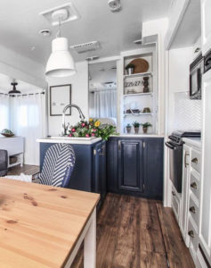 Camper Tour: See how @RVFixerUpper transforms drab 5th wheels into stylish tiny homes! MountainModernLife.com #rvrenovation #campertour
