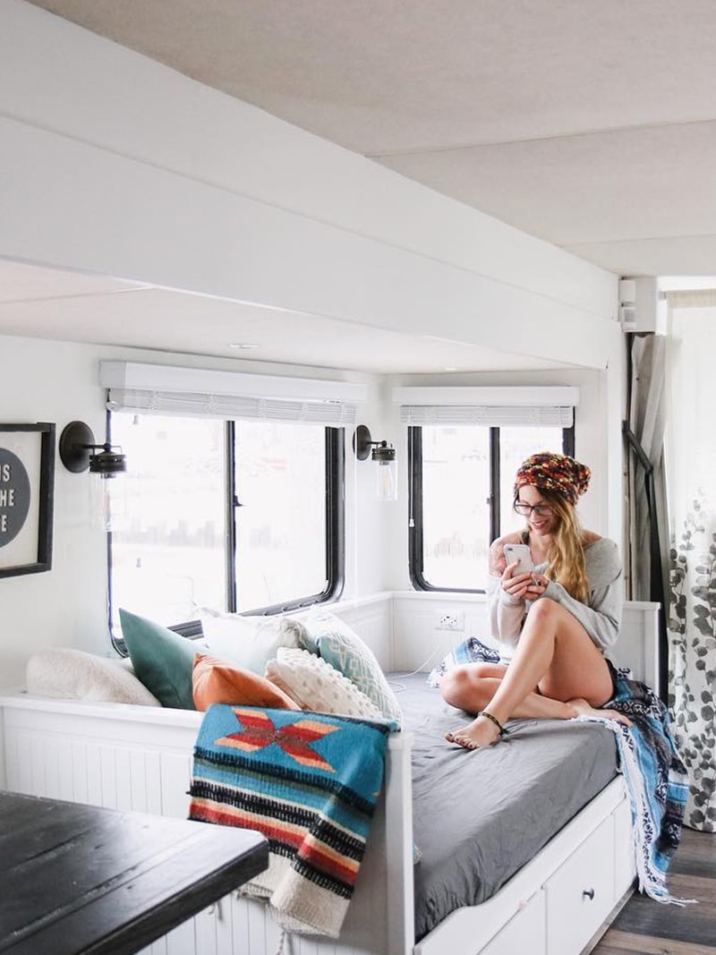 Tour this RV renovated for a family of 4 from @CaitiJackson! Featured on MountainModernLife.com