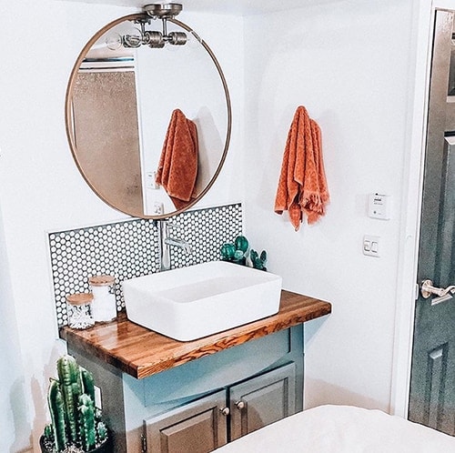 Tour this renovated camper that was transformed by a couple with a passion for international travel! // Photos by ems_traveldiary // Featured on MountainModernLife.com