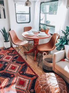 Tour this renovated camper inspired by international travel! // Photos from: ems_traveldiary on Instagram // Featured on MountainModernLife.com