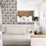 Tour this budget-friendly farmhouse camper that was transformed for $500 by Proverbs31Girl! Featured on MountainModernLife.com