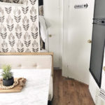 Tour this budget-friendly farmhouse camper that was transformed for $500 by Proverbs31Girl! Featured on MountainModernLife.com