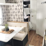 Tour this budget-friendly farmhouse camper that was transformed for $500 by Proverbs31Girl! Featured on MountainModernLife.com