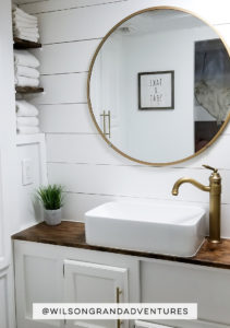 Tour this remodeled RV filled with lots of white, shiplap, and warm wood tones from @WilsonGrandAdventures! Featured on MountainModernLife.com