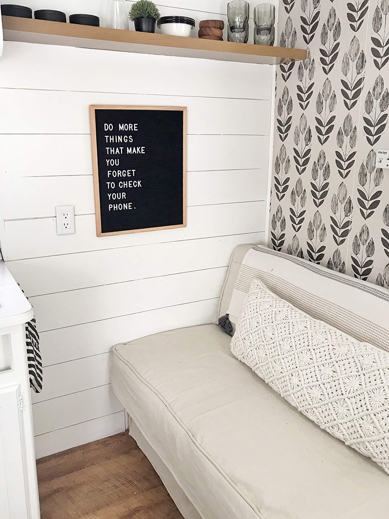 Tour this budget-friendly farmhouse camper that was transformed for $500 by Proverbs31Girl! Featured on MountainModernLife.com