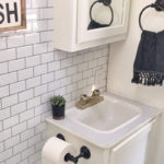 Tour this budget-friendly farmhouse camper that was transformed for $500 by Proverbs31Girl! Featured on MountainModernLife.com