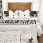 Tour this budget-friendly farmhouse camper that was transformed for $500 by Proverbs31Girl! Featured on MountainModernLife.com