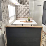 Tour this budget-friendly farmhouse camper that was transformed for $500 by Proverbs31Girl! Featured on MountainModernLife.com