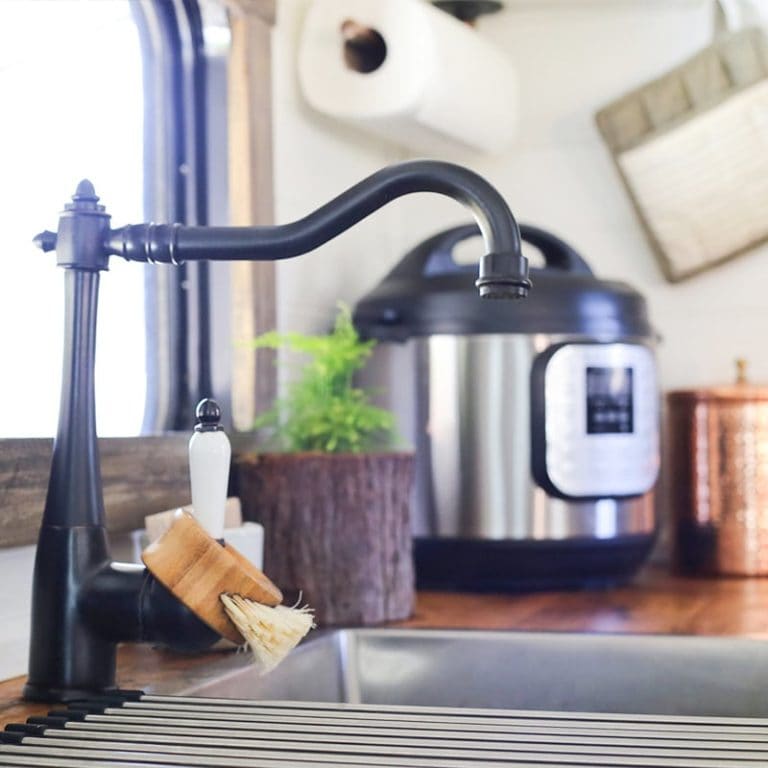 RV kitchen with black faucet