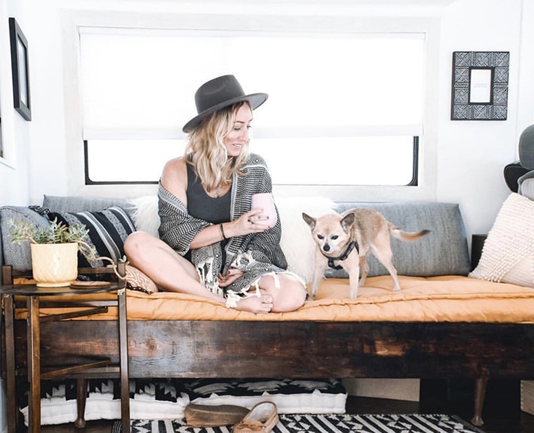 This couple lives on a blueberry farm in their bohemian-inspired RV! View the tour from @TheRamblrRV on MountainModernLife.com