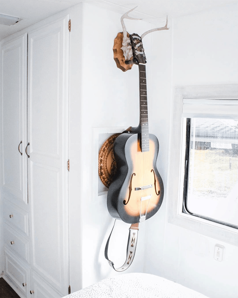 This couple lives on a blueberry farm in their bohemian-inspired RV! View the tour from @The_Ramblr_RV on MountainModernLife.com