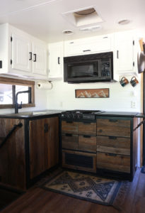 Considering adding black kitchen countertops to your home? Come see how we updated butcher block countertops for a rustic modern vibe in our RV. MountainModernLife.com