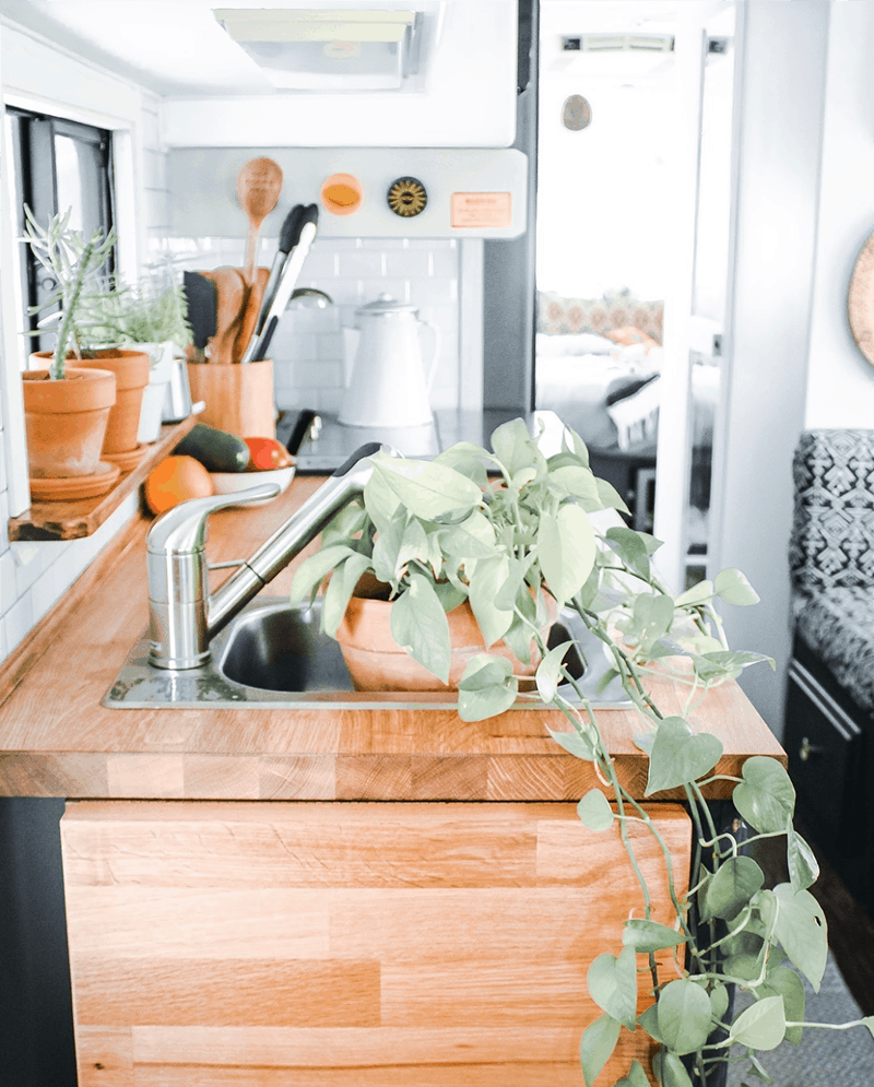 This couple lives on a blueberry farm in their bohemian-inspired RV! View the tour from @TheRamblrRV on MountainModernLife.com