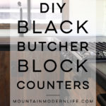 Considering adding black kitchen countertops to your home? Come see how we updated butcher block countertops for a rustic modern vibe in our RV. MountainModernLife.com