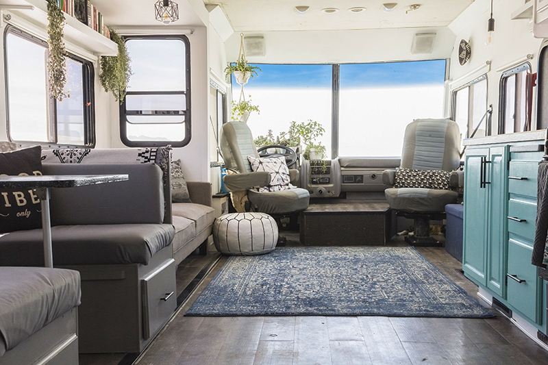 This RV has been transformed into an off-grid tiny home on wheels (and it's for sale!) Photos from @LifeAmongPines - view the tour on MountainModernLife.com