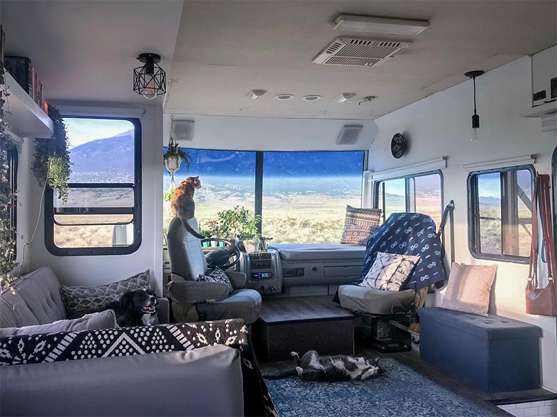 This RV has been transformed into an off-grid tiny home on wheels (and it's for sale!) Photos from @LifeAmongPines - view the tour on MountainModernLife.com
