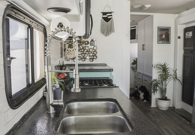 This RV has been transformed into an off-grid tiny home on wheels (and it's for sale!) Photos from @LifeAmongPines - view the tour on MountainModernLife.com