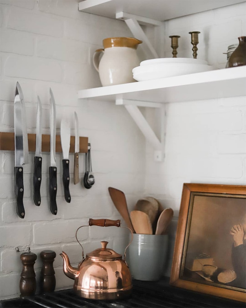 Tour this modern RV renovation with old world charm from @r.maria.fuller that has wood beams that will make you swoon! See the before and after on MountainModernLife.com