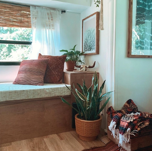 The muted earth tones in this eclectic camper will have you dreaming of the desert | Featuring @madefreeco on MountainModernLife.com