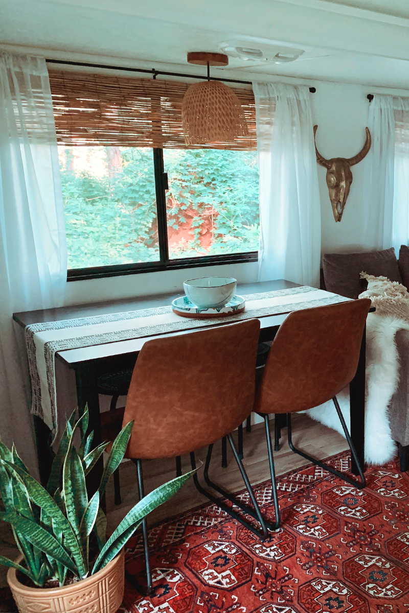 The muted earth tones in this eclectic camper will have you dreaming of the desert | Featuring @madefreeco on MountainModernLife.com