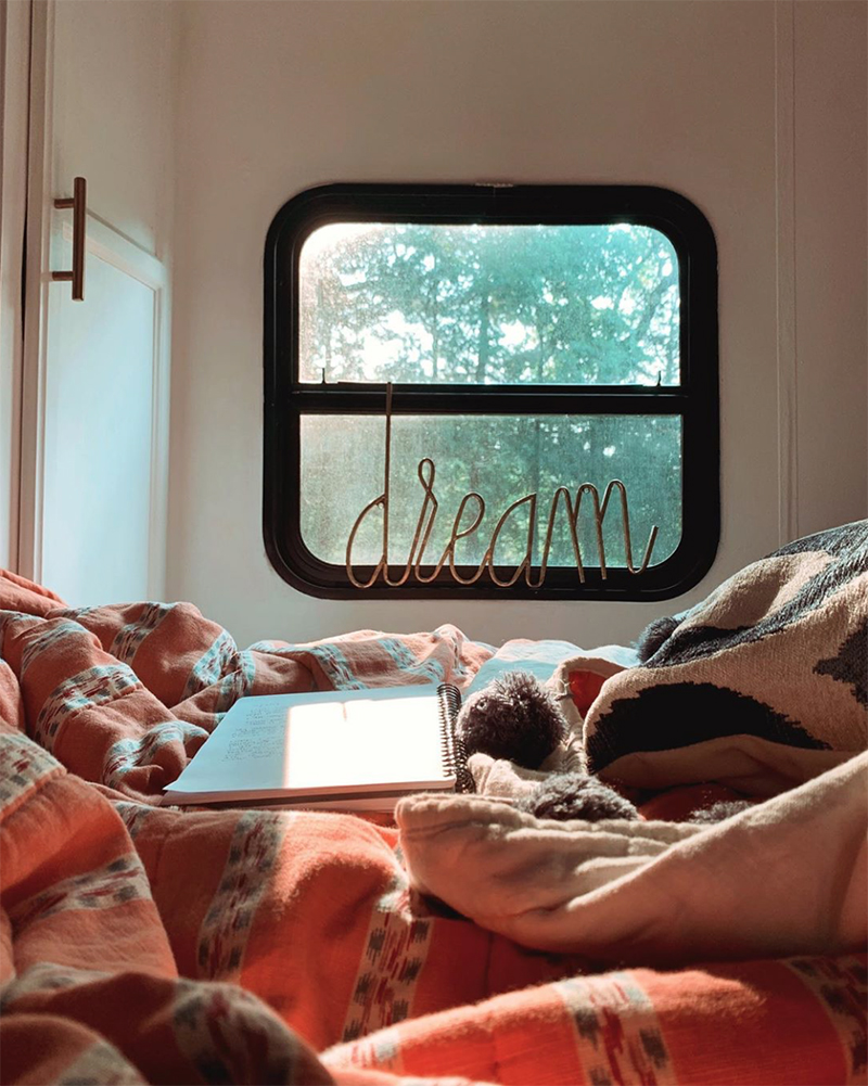 The muted earth tones in this eclectic camper will have you dreaming of the desert | Featuring @madefreeco on MountainModernLife.com