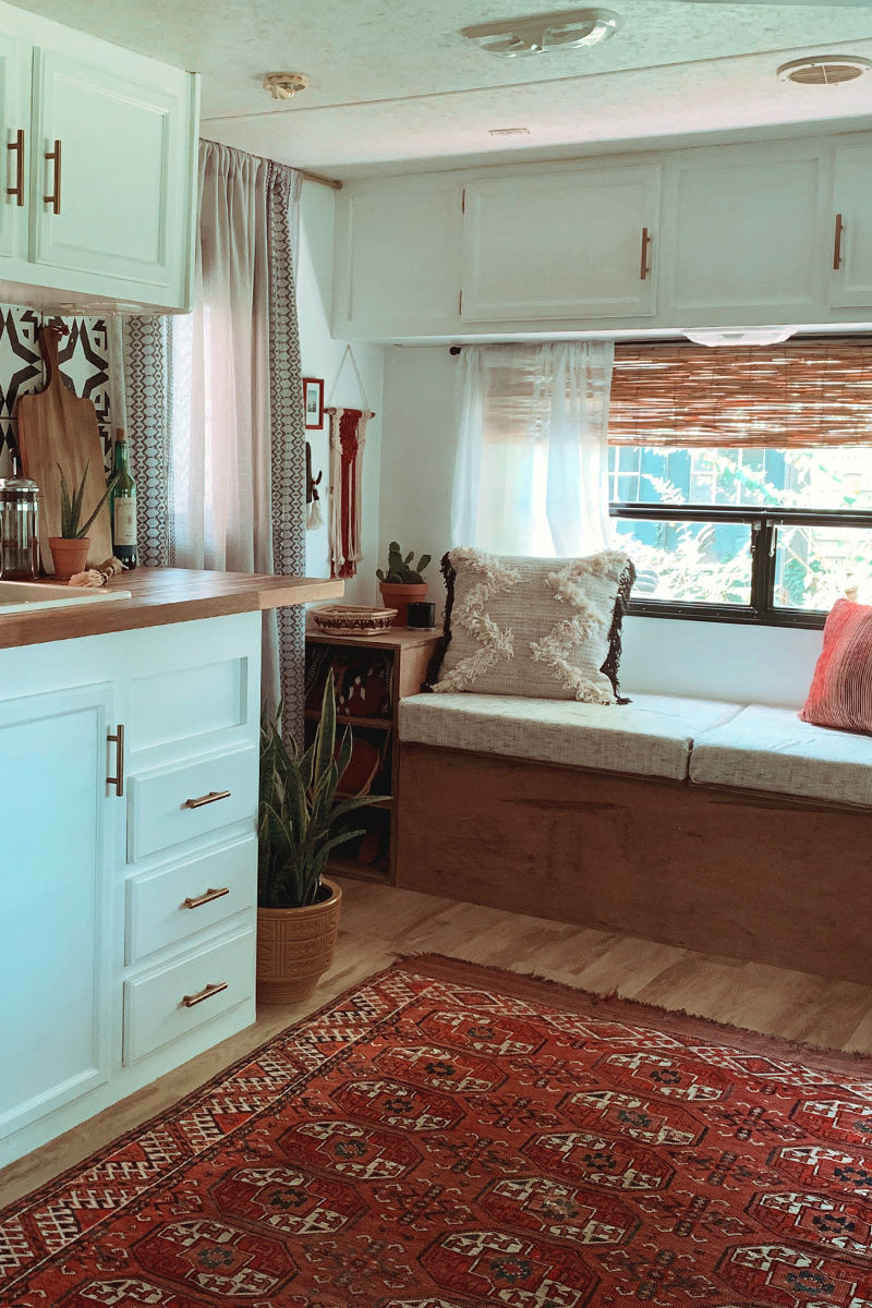 The muted earth tones in this eclectic camper will have you dreaming of the desert | Featuring @madefreeco on MountainModernLife.com