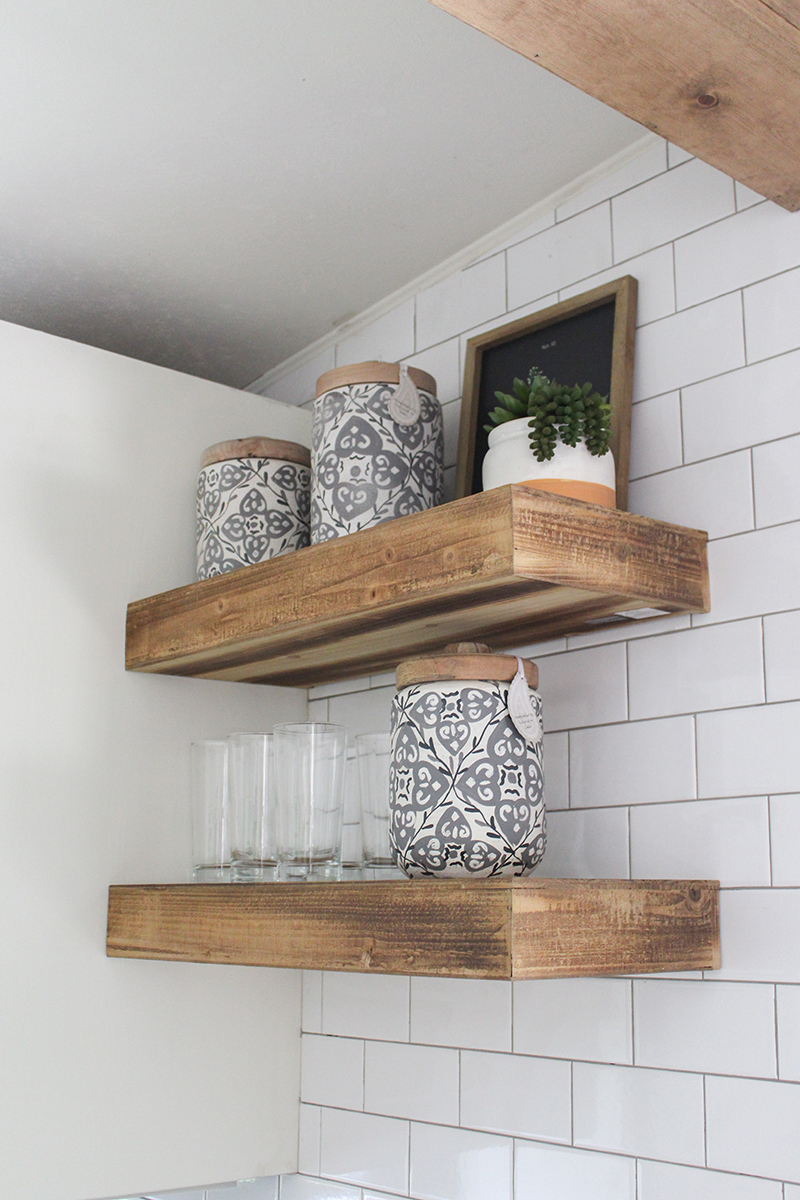 This remodeled RV kitchen has floating shelves (and it's for sale!). Featuring @karleemmarsh on MountainModernLife.com