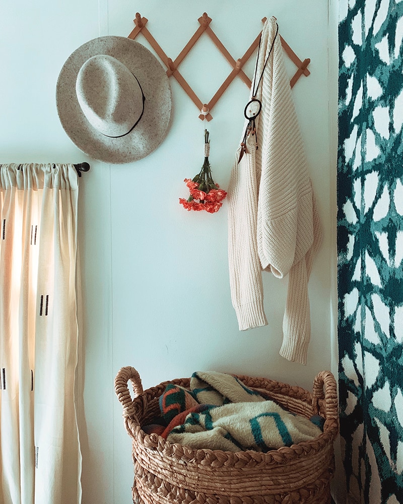 The muted earth tones in this eclectic camper will have you dreaming of the desert | Featuring @madefreeco on MountainModernLife.com