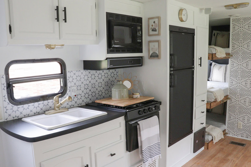 This Nashville Couple brings new life to outdated campers! Come see the before and after photos of their Forest River RV transformation! Featuring @bestofourtodays on MountainModernLife.com